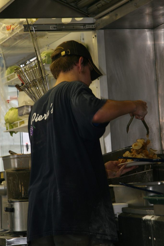 Teenager working in a fast food company