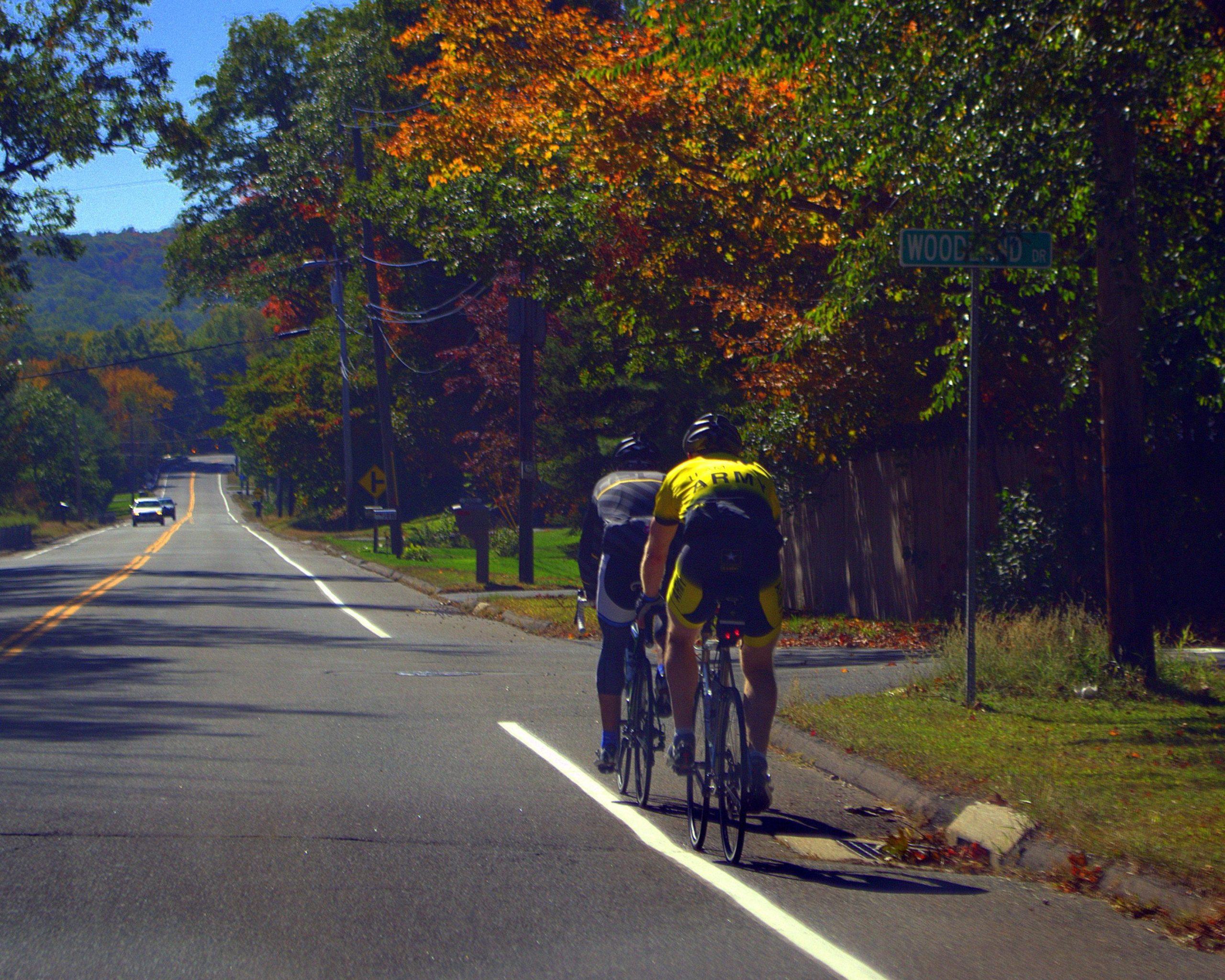 Men riding bikes