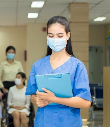 Female doctor reviewing a file